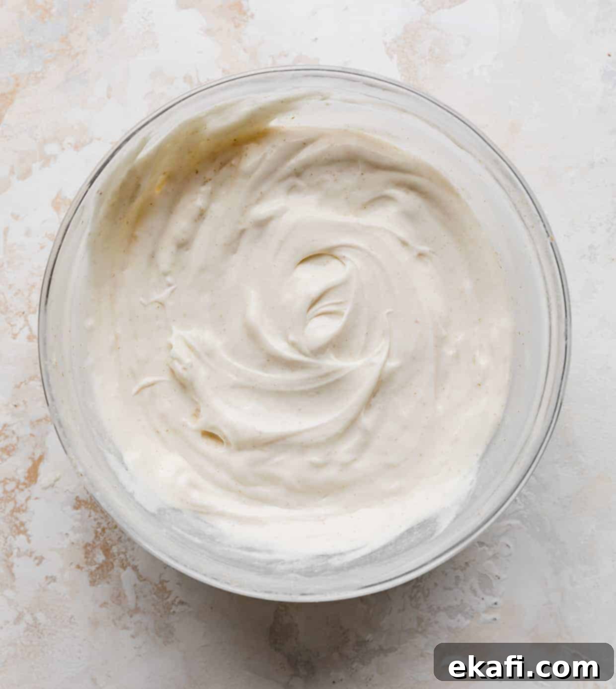 Crispy Fish Taco Bliss 5 A glass bowl full of homemade white sauce for fish tacos, creamy and ready to be served.