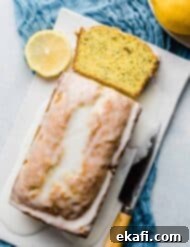 Cake Mix Lemon Poppy Seed Loaf 10 Lemon Poppy Seed Bread on a white rectangle plate.