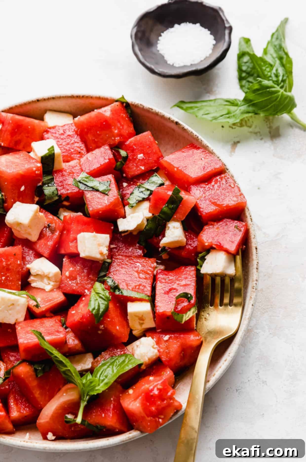 Watermelon Feta Basil Harmony 6 A close-up view of the cubed Watermelon Feta Basil Salad, highlighting the fresh ingredients and vibrant colors.