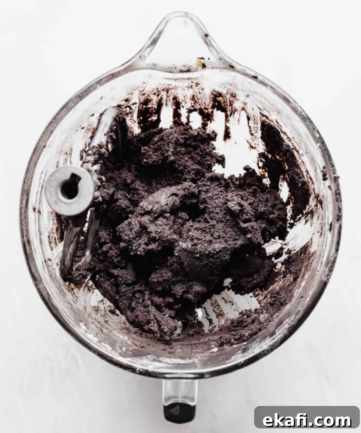 Crumbl Oreo Cookie Sandwiches 4 Homemade giant Oreo cookie batter in a glass stand mixer bowl.
