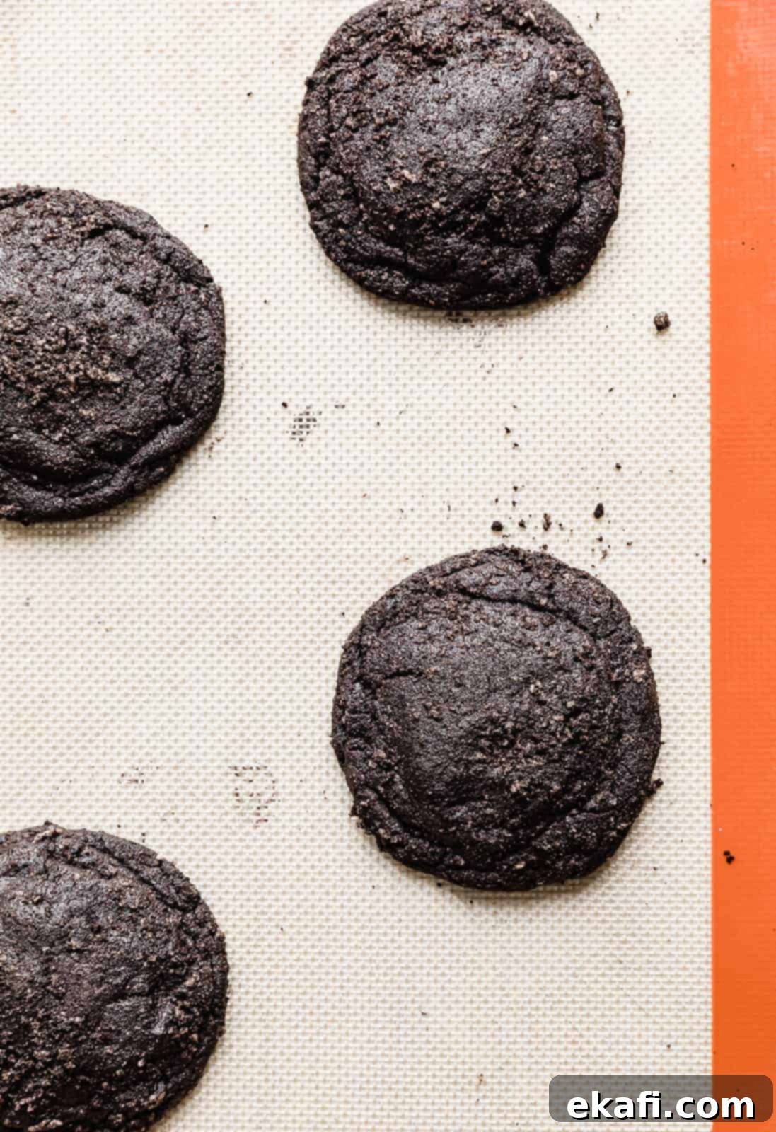 Crumbl Oreo Cookie Sandwiches 6 A baked copycat Crumbl Oreo sandwich cookie on a baking sheet.