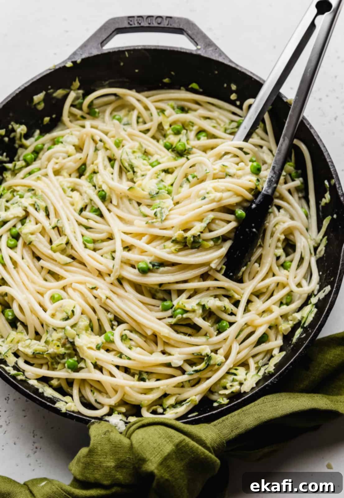 Summer Zucchini Delight 13 Close up photo of Pasta with Zucchini Sauce in a black skillet.