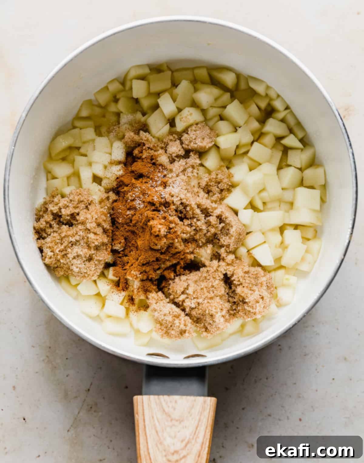 Flaky Apple Turnovers 6 Diced apples with brown sugar, cinnamon overtop.