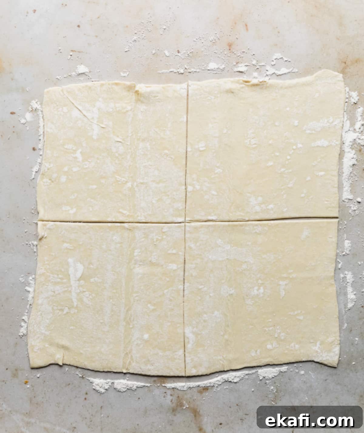 Flaky Apple Turnovers 8 A square of puff pastry cut into 4 equal squares.