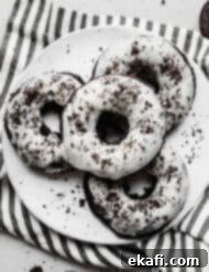 Cookies and Cream Donuts 14 Oreo Donuts on a striped napkin.