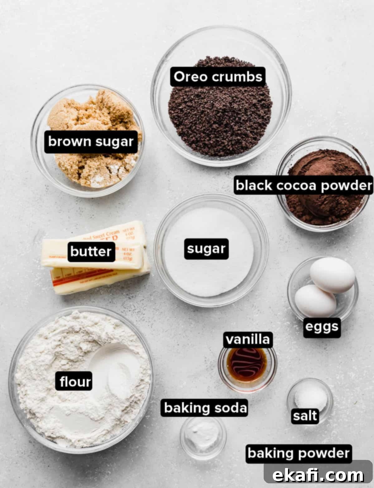 Craft Your Own Chocolate Cream Sandwiches 3 Homemade Oreo Cookie ingredients in glass bowls on a white background.