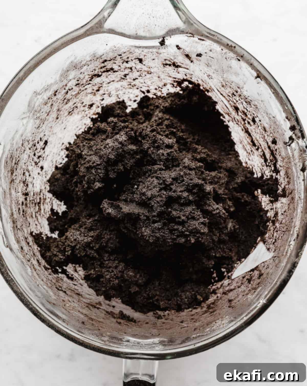Craft Your Own Chocolate Cream Sandwiches 7 Homemade Oreo cookie batter in a glass bowl.