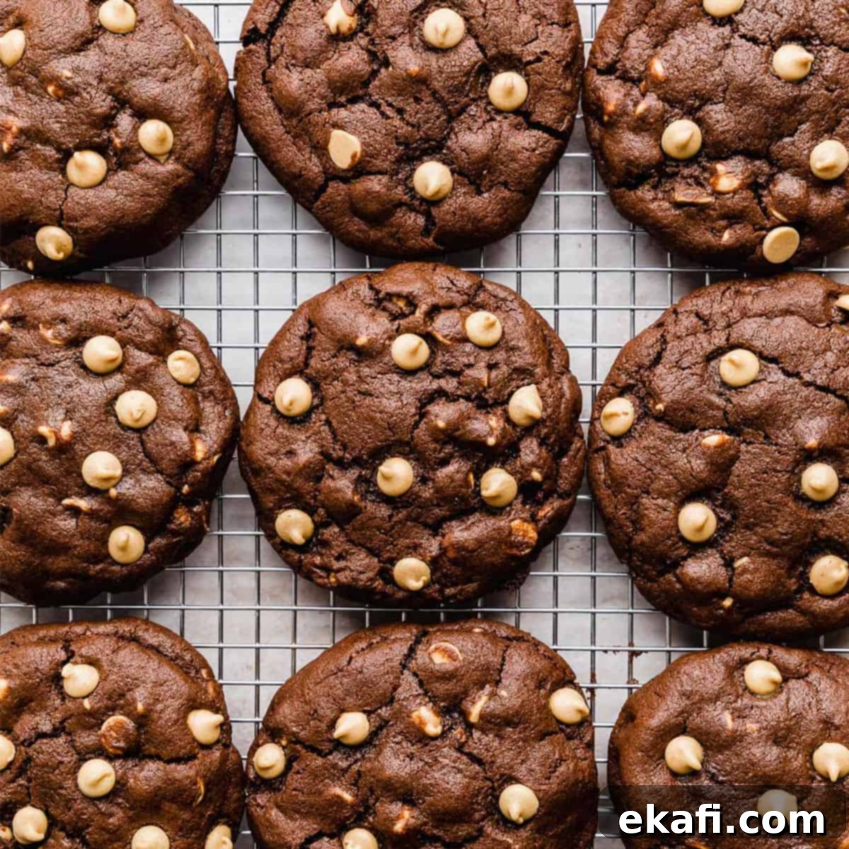 Decadent Peanut Butter Chocolate Chip Cookies 2 Soft, decadent Chocolate Peanut Butter Chip Cookies lined up perfectly on a wire cooling rack, ready to be enjoyed.
