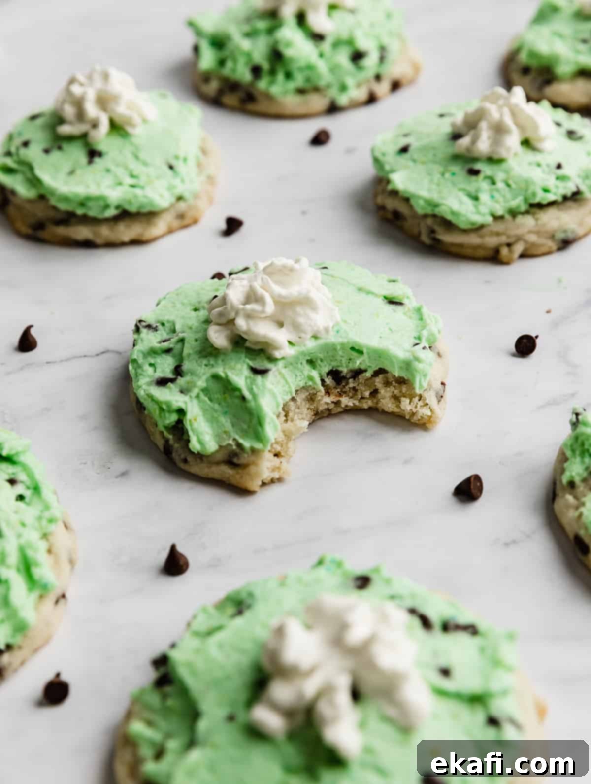 Crumbl's Mint Chip Ice Cream Cookie Delight 15 A bite taken out of a copycat Crumbl Mint Chip Ice Cream Cookie.