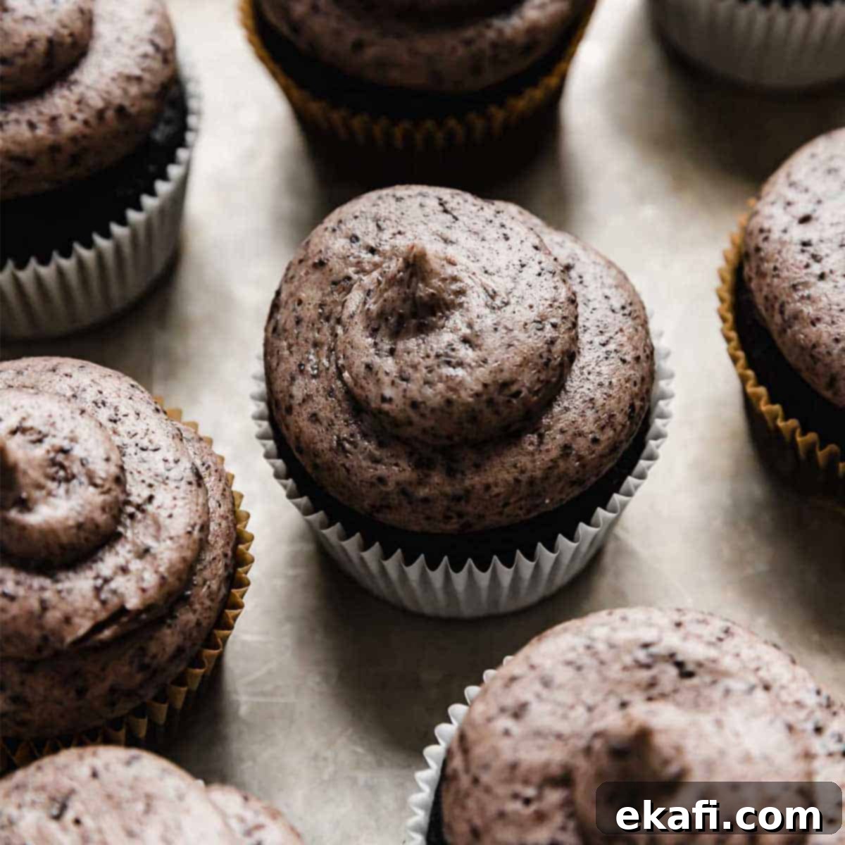 Irresistible Oreo Desserts 11 Oreo Frosting swirled on a black cupcake.