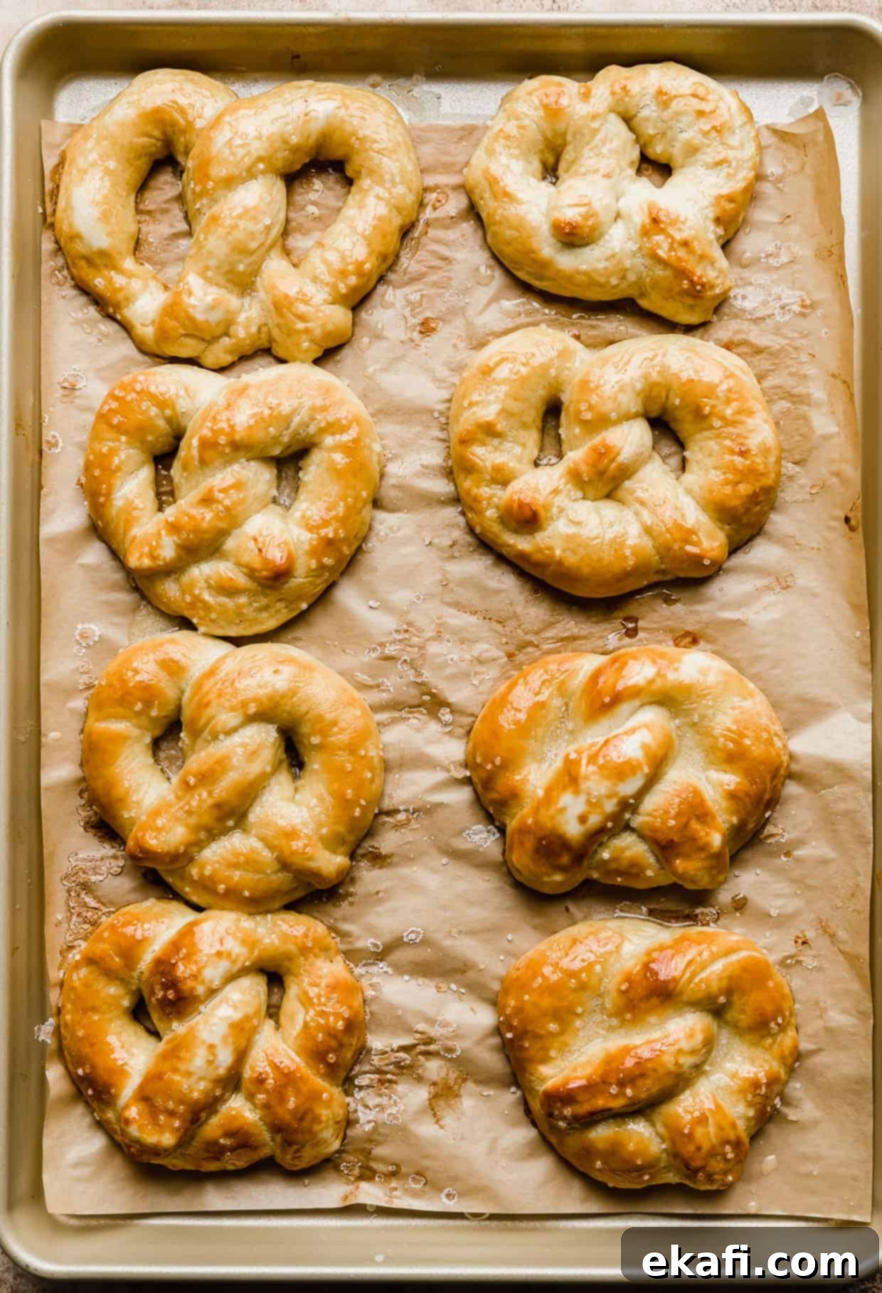 Perfect Homemade Soft Pretzels 11 A baking sheet filled with freshly baked Homemade Soft Pretzels, golden brown and ready to be served, perfect for a snack.