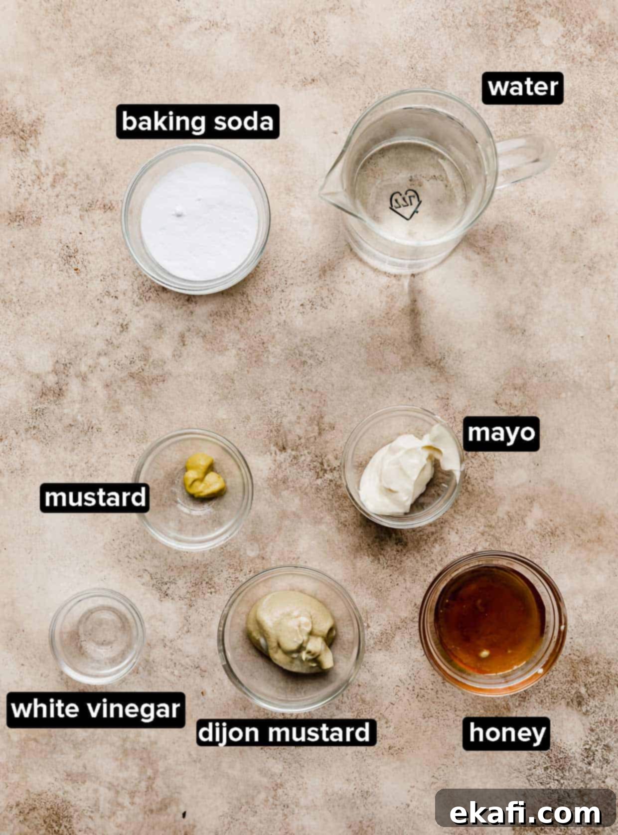 Perfect Homemade Soft Pretzels 4 Ingredients for the baking soda bath and a homemade dijon mustard dip, including baking soda, mustards, honey, and mayo.