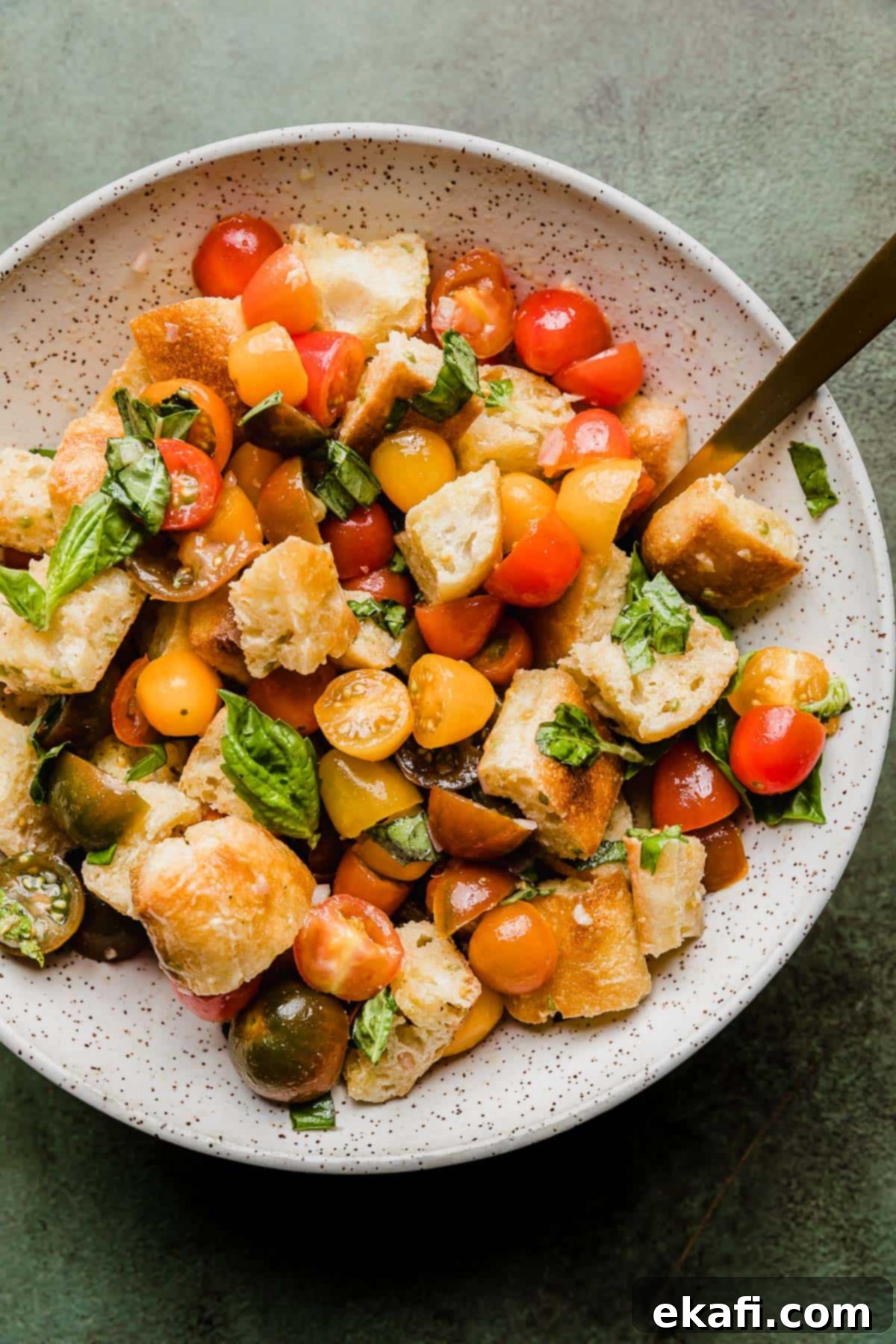 Rustic Tuscan Panzanella 8 Cubed bread, chopped tomatoes, fresh basil with a Panzanella Toscana dressing drizzled overtop.