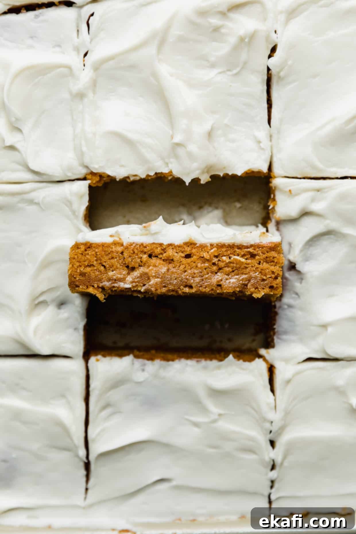 Golden Pumpkin Spice Bars 9 Large squares of Libby's Pumpkin Bars beautifully topped with a generous layer of cream cheese frosting, ready to be enjoyed.