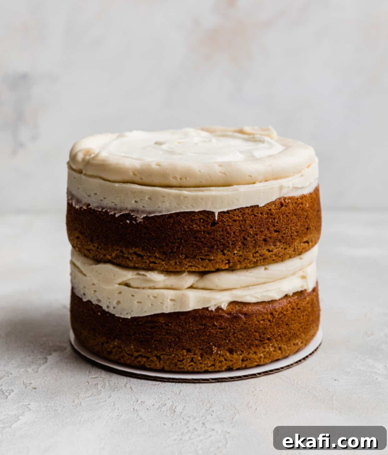 Golden Oreo Dream Cake 10 Two cake layers topped with Golden Oreo frosting and a white whipped filling.