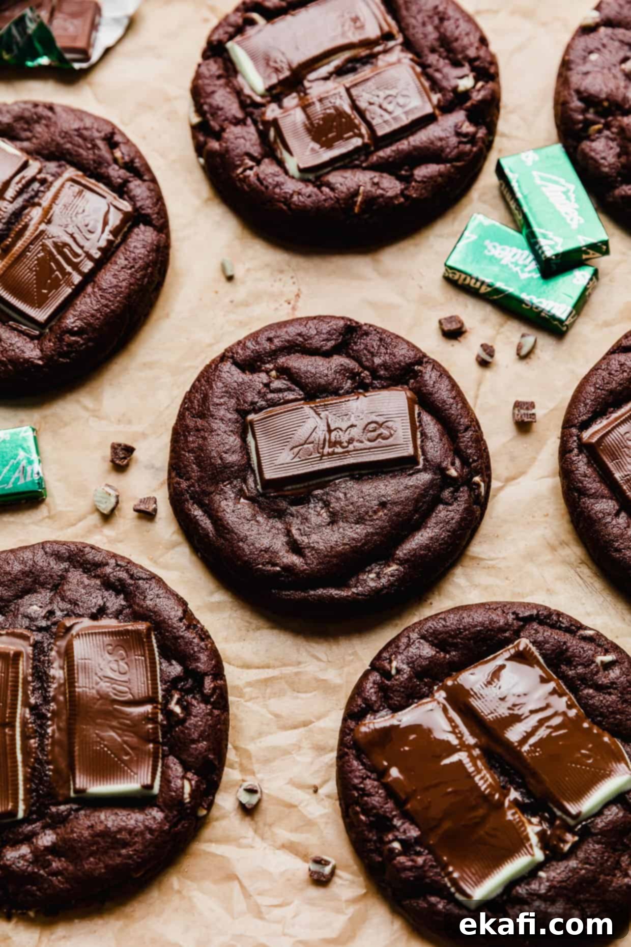 Decadent Andes Mint Chocolate Cookies 2 Chocolate Andes Mint Cookies on a tan parchment paper.