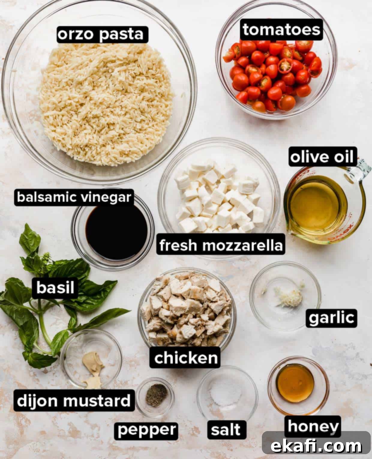 Perfect Summer Caprese Orzo 3 Orzo caprese salad ingredients on a white background.
