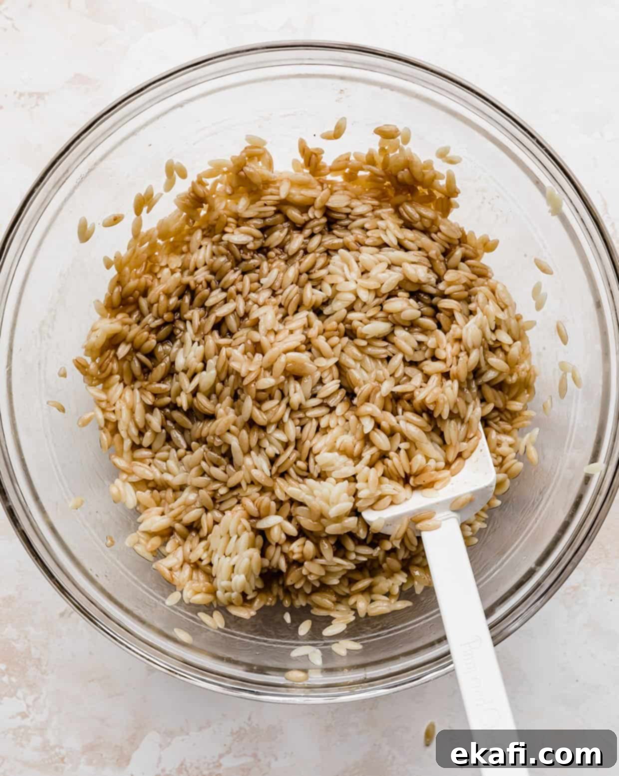 Perfect Summer Caprese Orzo 6 Orzo salad that has a balsamic dressing coating the noodles.