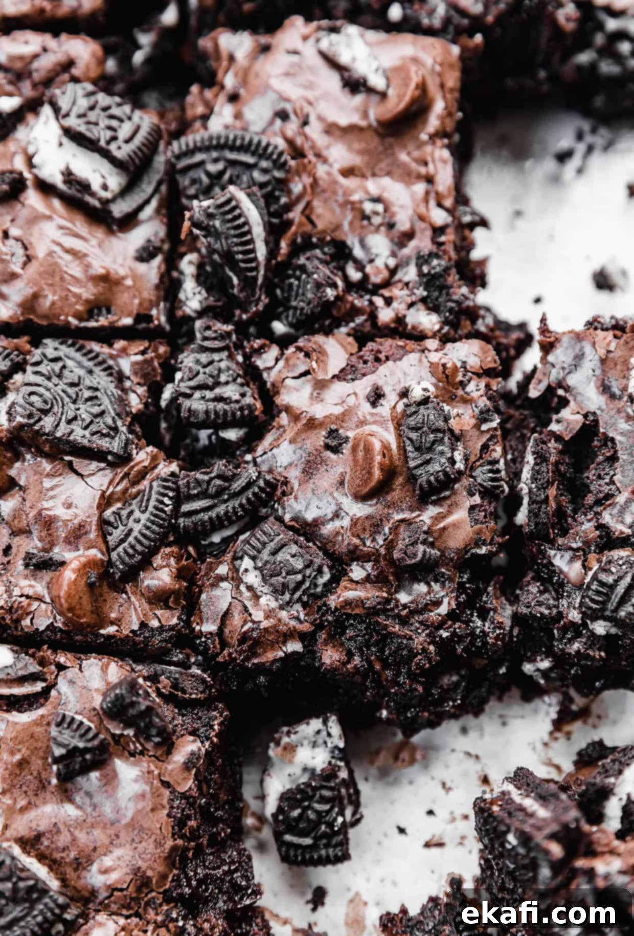 Ultimate Oreo Fudge Brownies 12 Oreo Brownies in a glass pan topped with chopped Oreos.