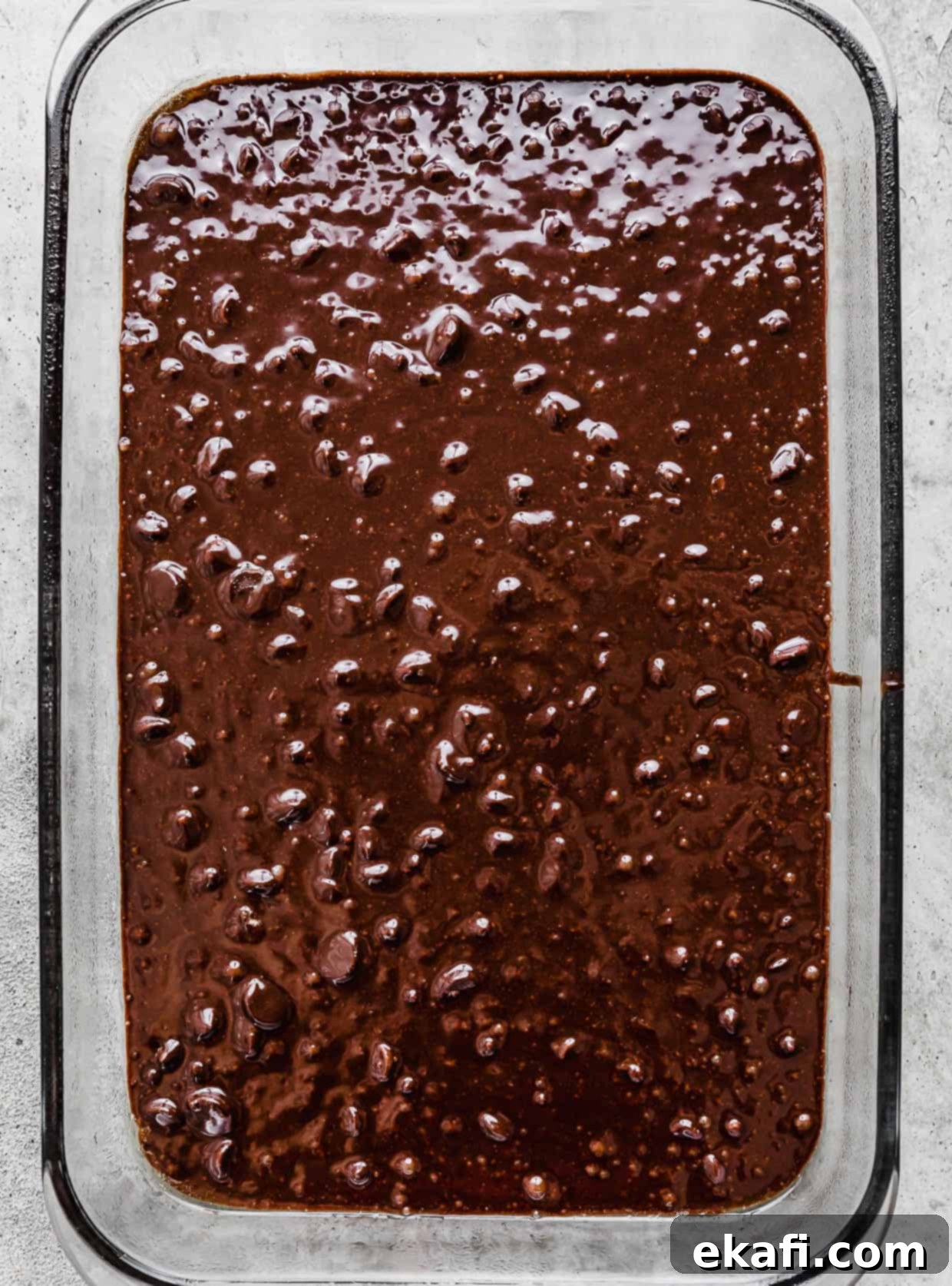 Ultimate Oreo Fudge Brownies 6 Raw brownie batter in a glass rectangular pan.