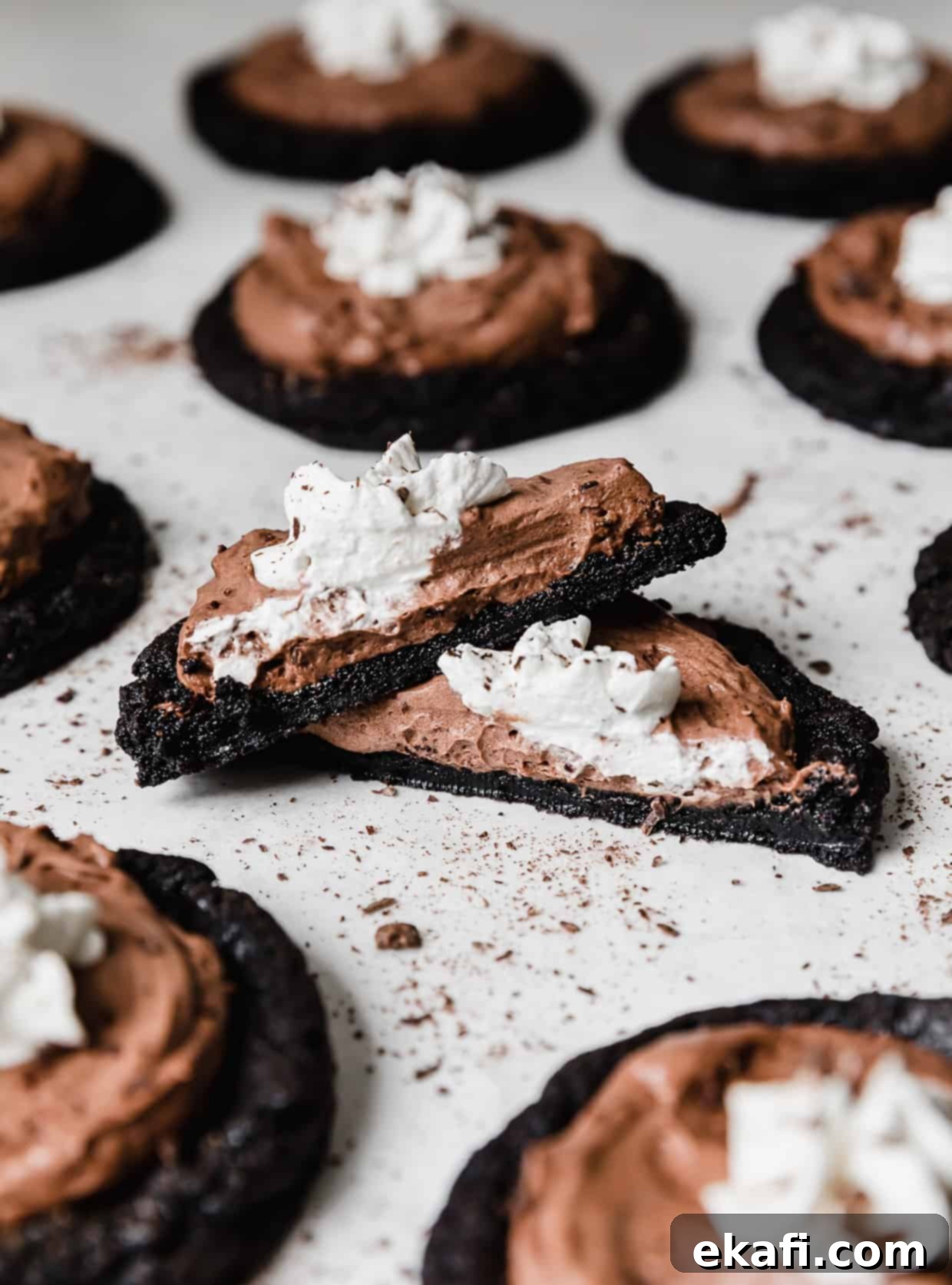 Decadent French Silk Pie Cookies 12 French Silk Pie Cookie cut in half, on a white background.