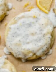 Zesty Lemon Poppy Seed Delights 15 Lemon Poppy Seed Cookies on a light brown background.
