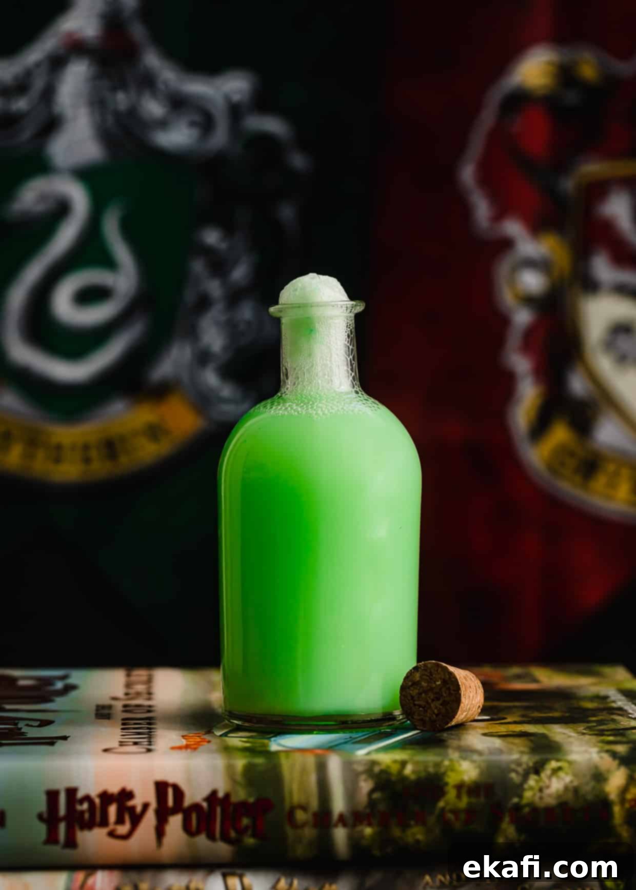 Shape-Shifter's Brew 2 A magical potion jar filled with vibrant green Polyjuice Potion, set against a backdrop of Slytherin and Gryffindor house flags, perfect for a Harry Potter party.