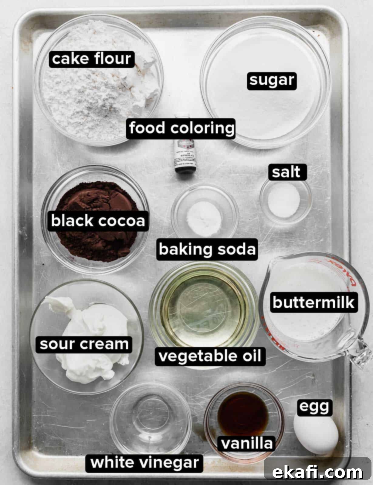 Phantom Frosted Treats 3 Ingredients used to make Black Velvet Cupcakes on a baking sheet.