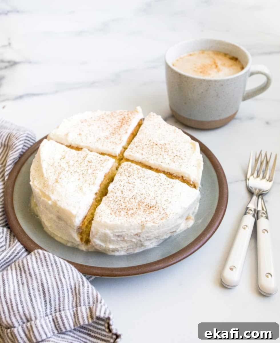 Petite Cake Perfection 11 Mini Tres Leches Cake Recipe for two, topped with whipped cream and cinnamon.
