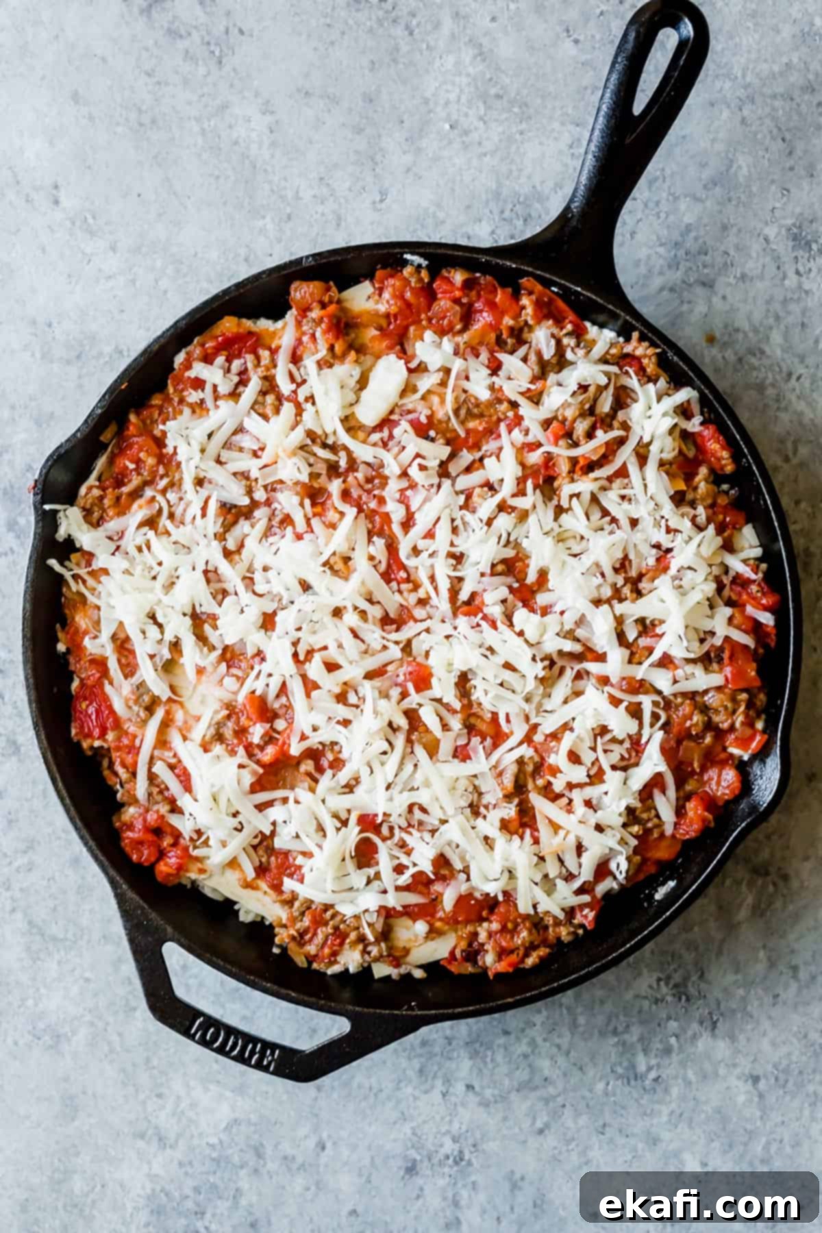 Rustic Cast Iron Lasagna 10 A Cast Iron Lasagna topped with mozzarella cheese.