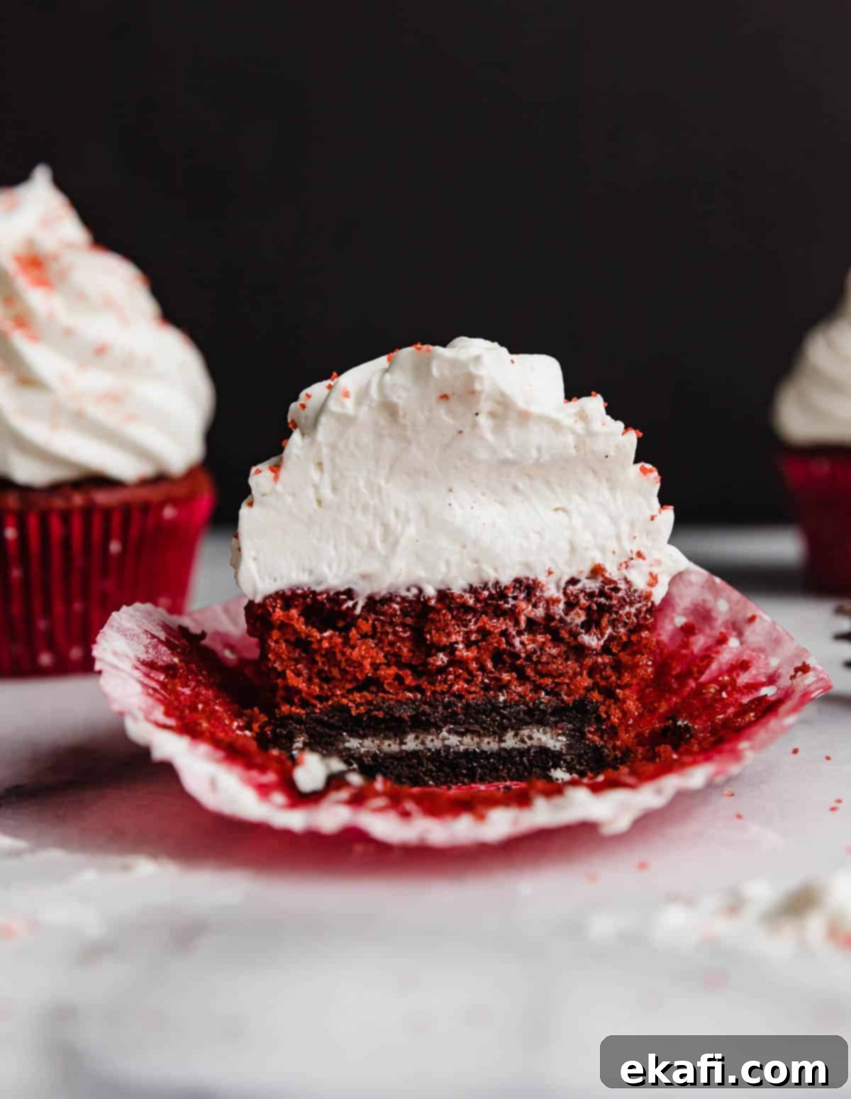 Crimson Velvet Delights 8 A red velvet cupcake baked on top of an Oreo.