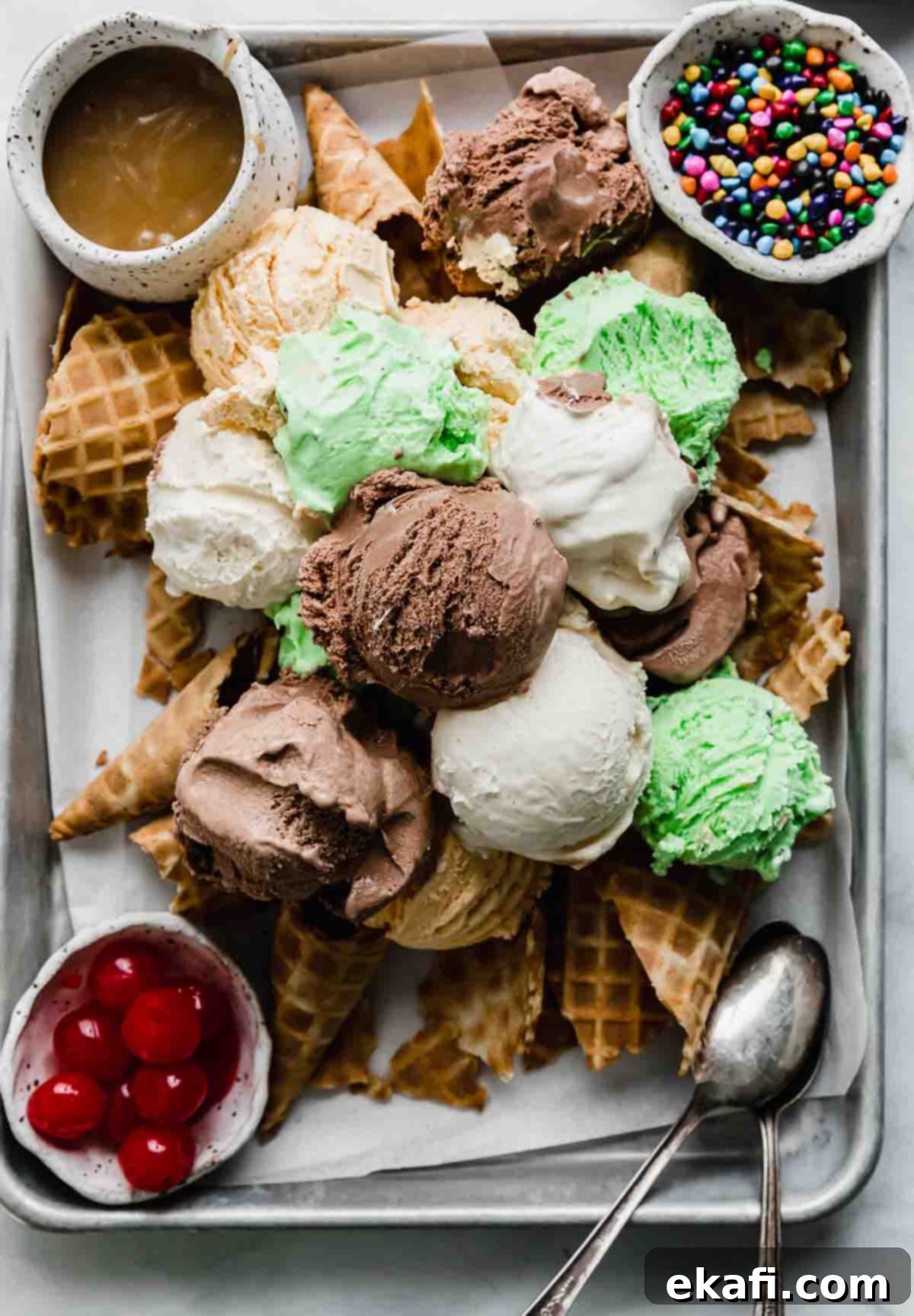 The Sweet Scoop Fiesta 5 Chocolate, vanilla, and mint chip scoops of ice cream on top of crunched up waffles cones (Ice Cream Nachos).