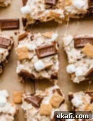 S'more Rice Krispie Treats 9 Hershey's chocolate bar and golden graham s'mores Rice Krispies treats on a Kraft background.