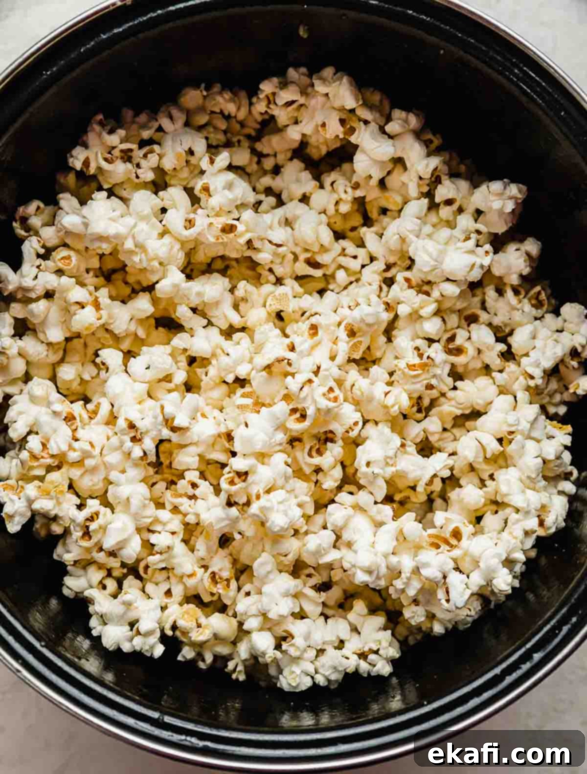Sweet and Salty Kettle Corn 5 A large pot filled with old fashioned Kettle Corn Popcorn.