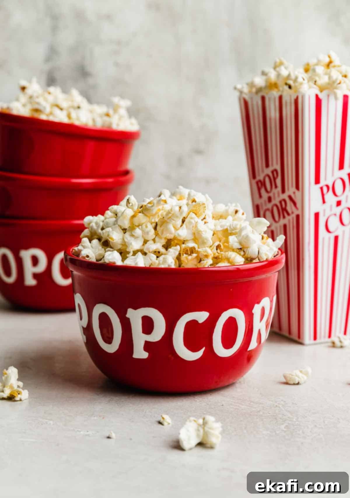 Sweet and Salty Kettle Corn 6 Kettle corn in a red bowl with the words, "popcorn" written in white on the bowl.