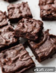 Brownies for Two 7 Small Batch Brownies cut into squares on a white background.