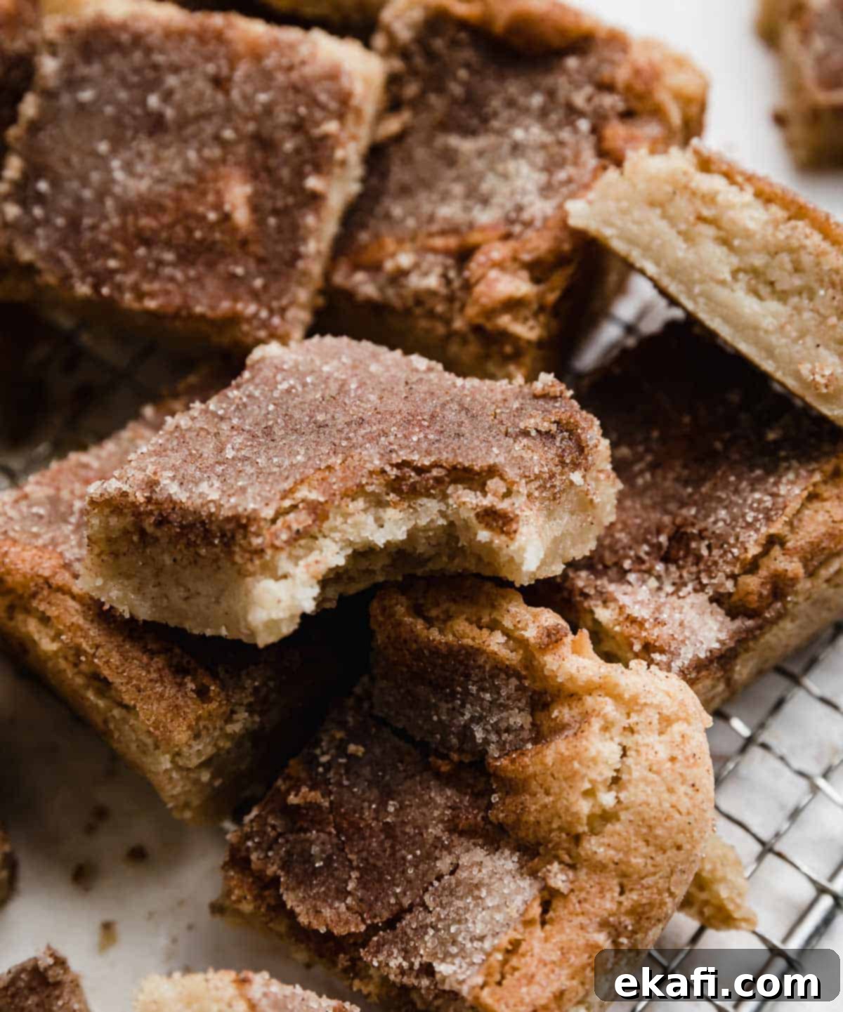 Chewy Snickerdoodle Blondies 7 A Snickerdoodle Bar with a bite taken out of it.