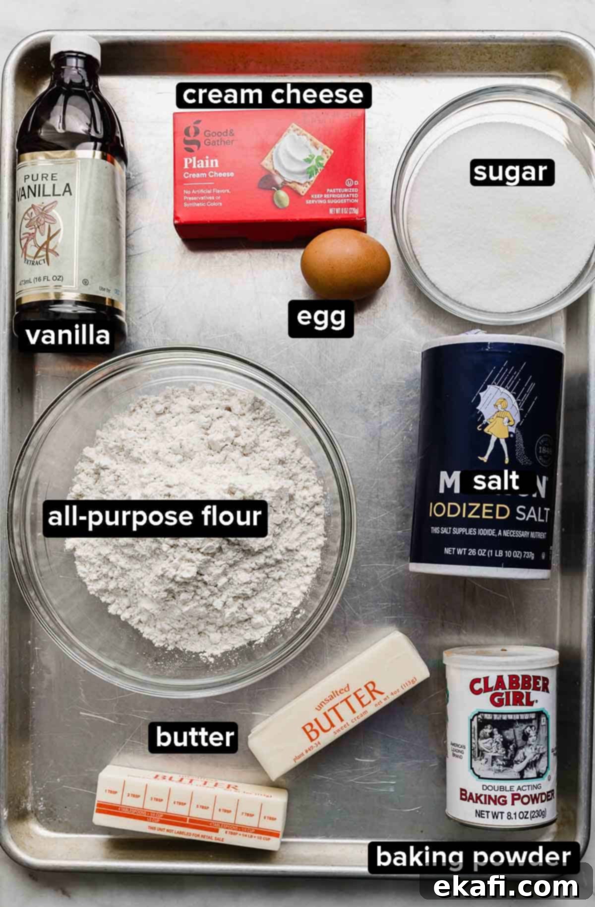 Fruity Dessert Cookie Pizzas 3 Crumbl cookies Fruit Pizza Cookies ingredients laid out on a clean white marble background, ready for baking.