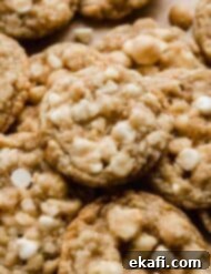 White Chocolate Macadamia Nut Cookies 8 A small stack of White Chocolate Macadamia Nut Cookies.
