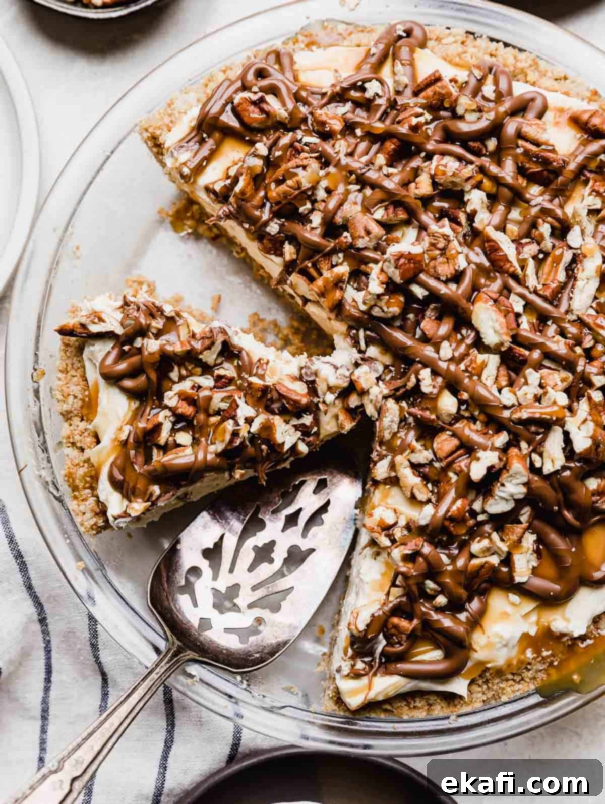 Caramel Pecan Utopia 8 Overhead photo of a Turtle Pie in a round pie pan.