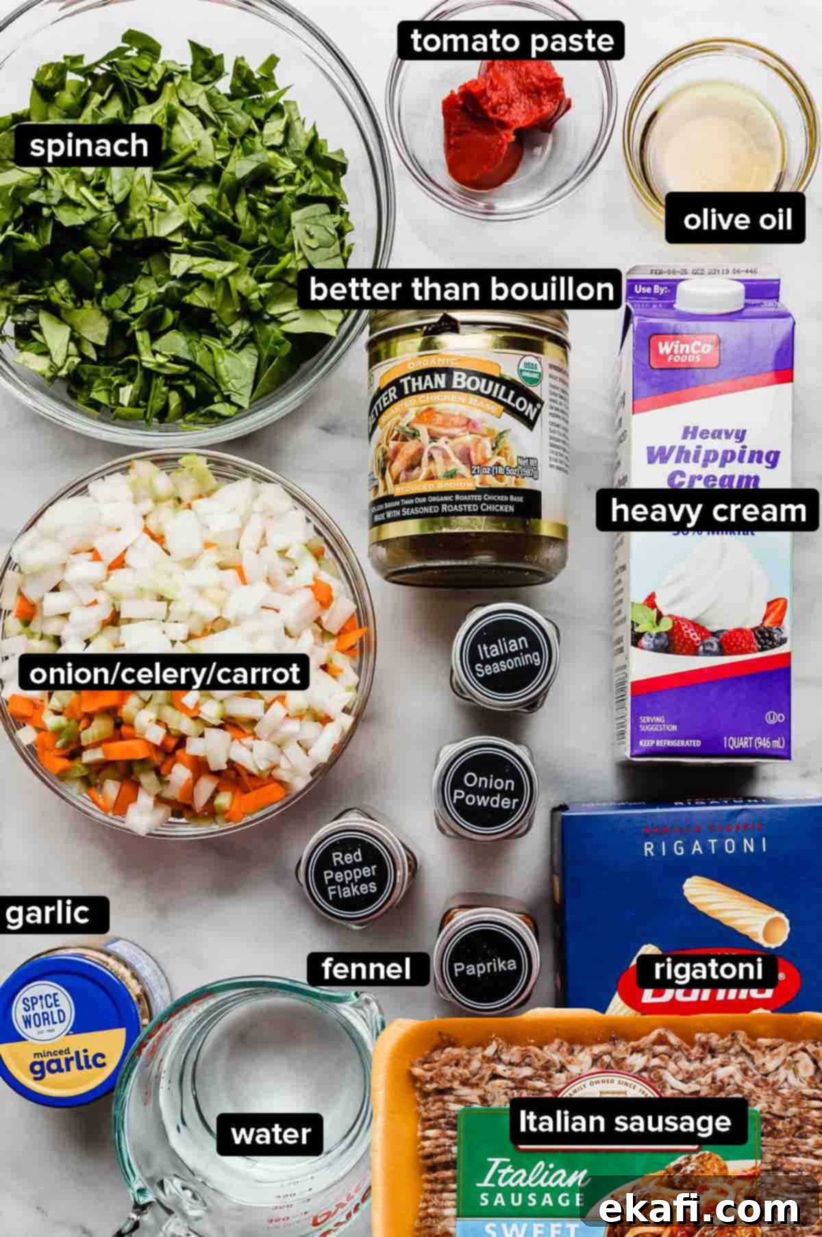 Italian Sausage Rigatoni 3 Italian Sausage Rigatoni ingredients on a white surface: pasta, Italian sausage, water, garlic, onions and carrots and celery, fennel, paprika, heavy cream, and chicken bouillon.