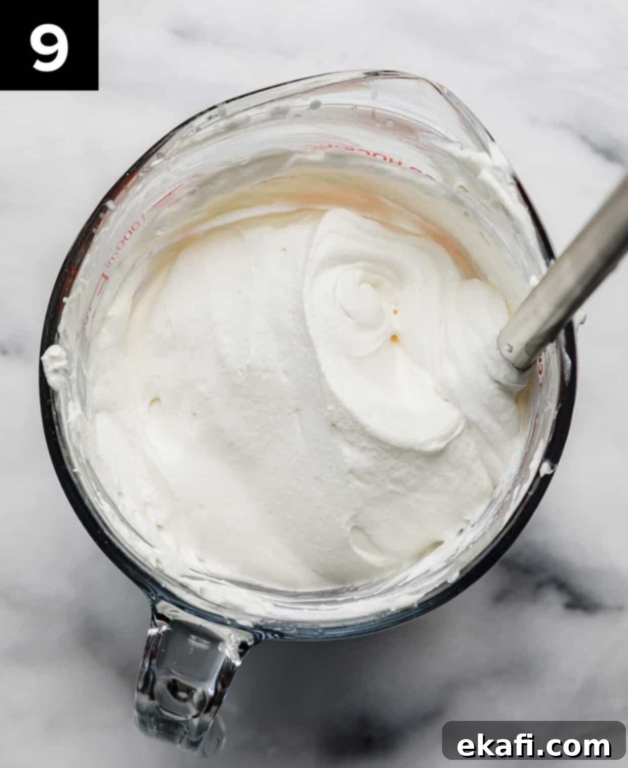 Grandma's Strawberry Shortcake 6 Freshly whipped billowy whipped cream in a glass bowl.
