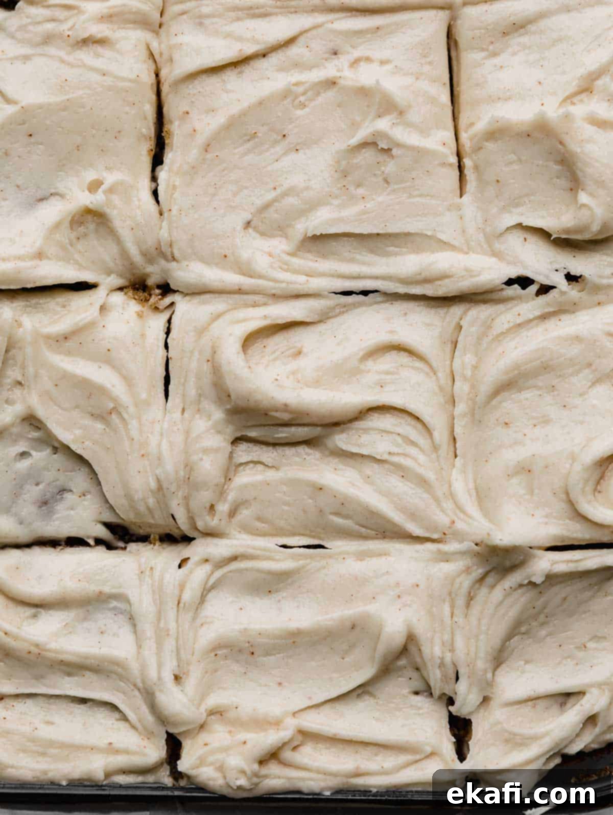 Golden Brown Butter Cream Cheese Frosting 2 Swirled Brown Butter Cream Cheese Frosting with small brown specks throughout the frosting.