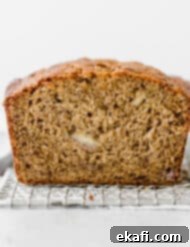 Irresistible Cinnamon Swirl Banana Bread 9 A loaf of Banana Bread on a white background.