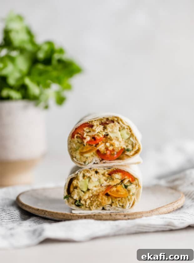 Creamy Avocado Chicken Wraps 2 Avocado Chicken Wraps on a plate, showcasing a delightful and healthy meal.