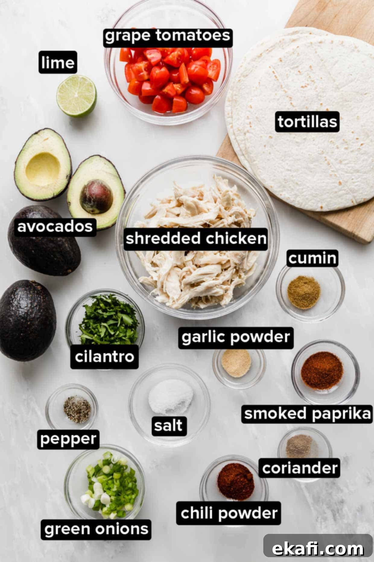 Creamy Avocado Chicken Wraps 4 Ingredients used to make Avocado Chicken Wraps, laid out for preparation.