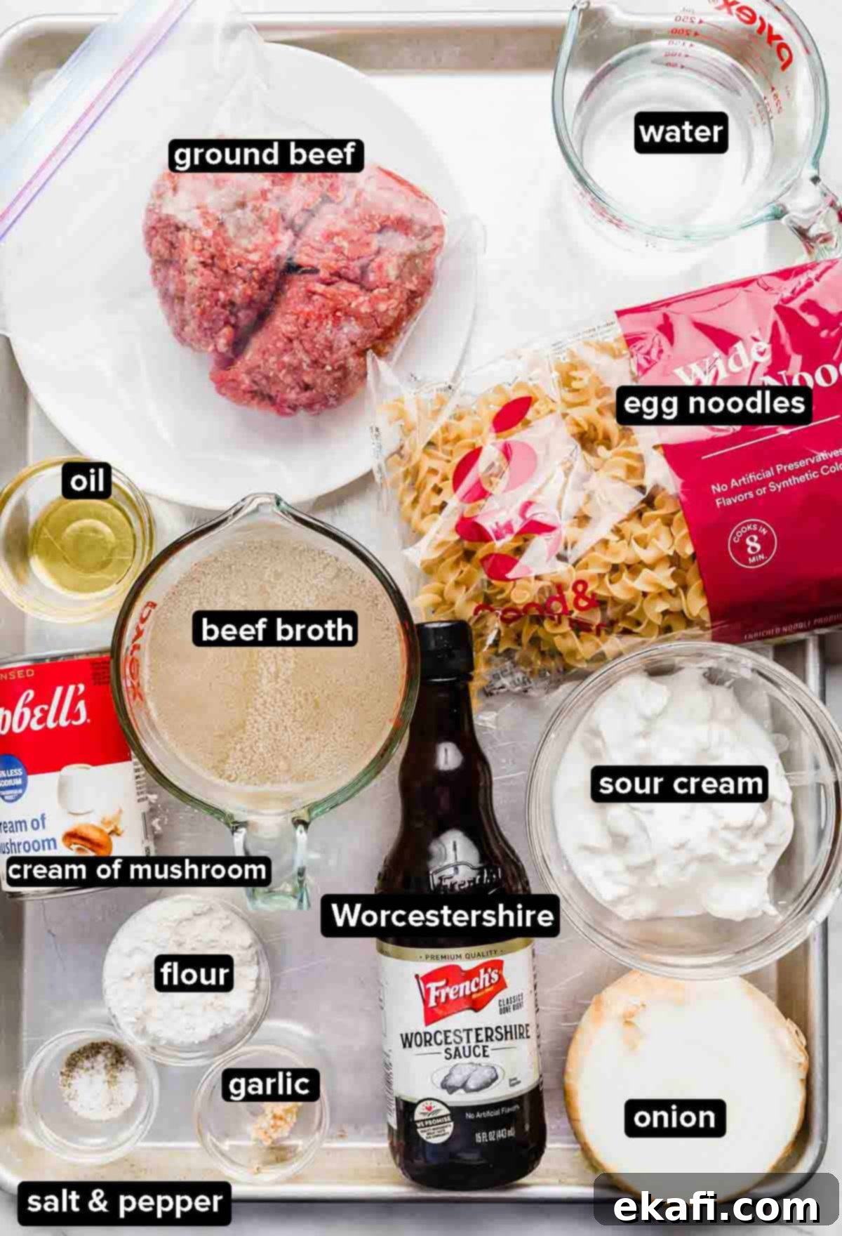 Instant Pot Ground Beef Stroganoff 3 Instant Pot Beef Stroganoff ingredients laid out on a baking sheet.