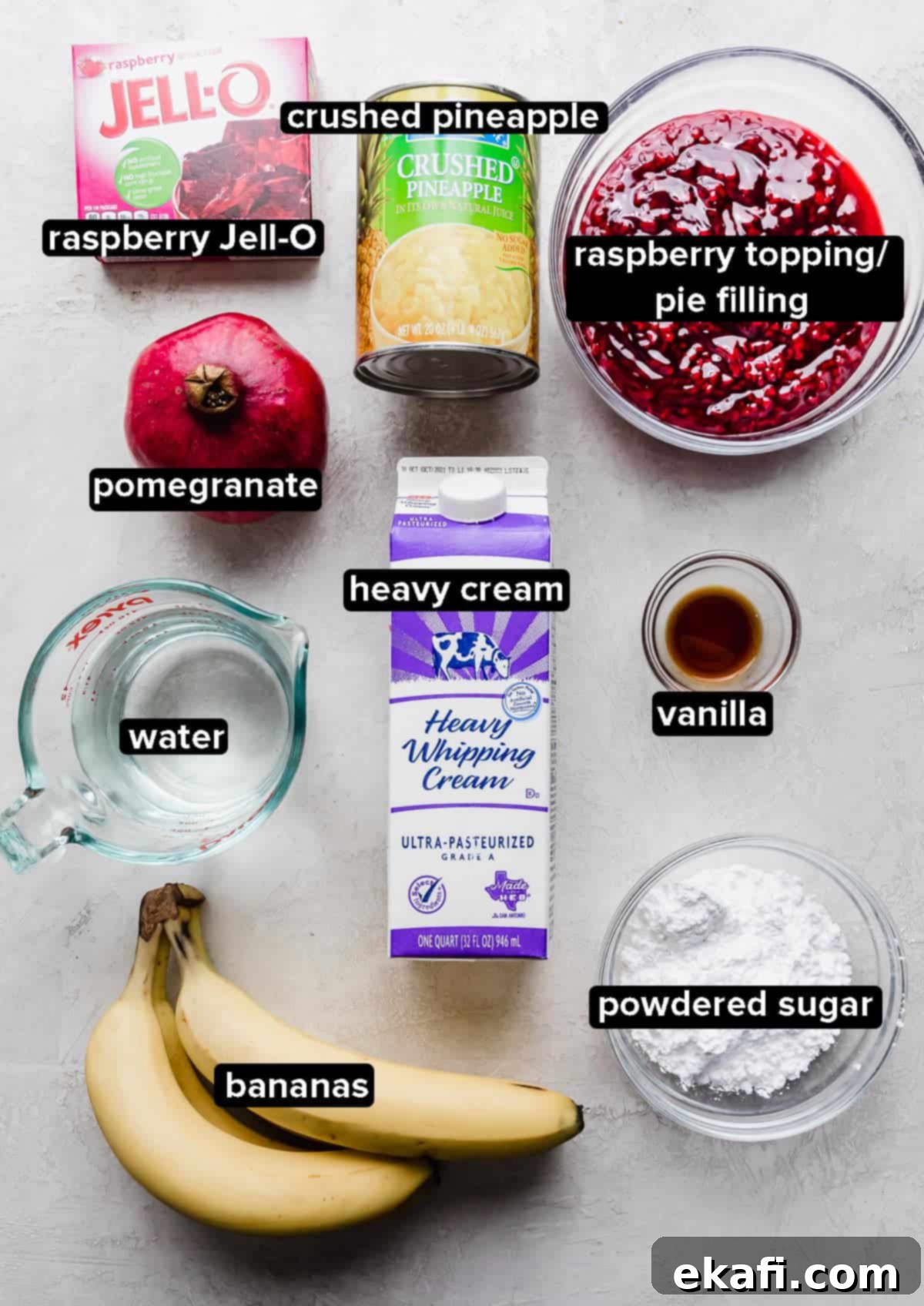 Ruby Pomegranate Delight 3 Pomegranate Jell-O ingredients laid out on a gray background.