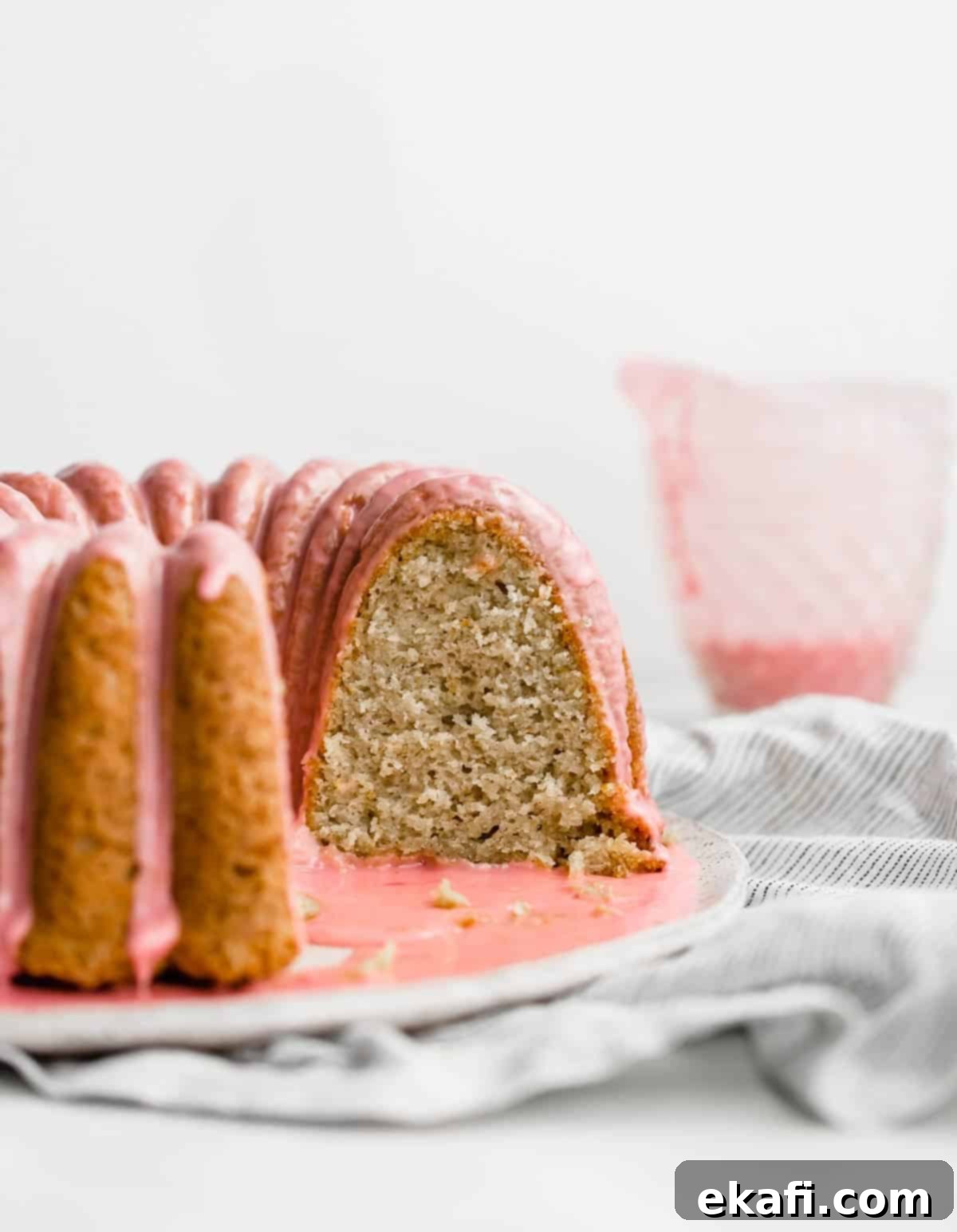 Vibrant Blood Orange Bundt Cake 8 A slice of blood orange bundt cake with cardamom, showing the soft, moist interior and golden crumb.