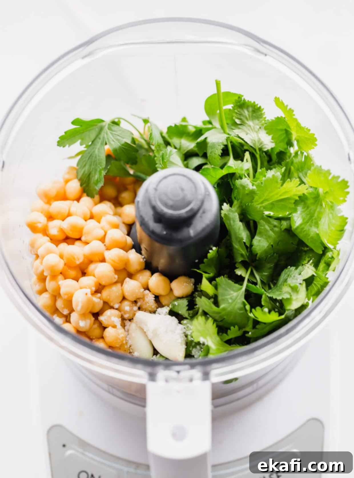 Fresh Herb Falafel 4 Food processor with chickpeas, fresh parsley in it.
